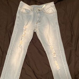 Blue Ripped Jeans. Never worn